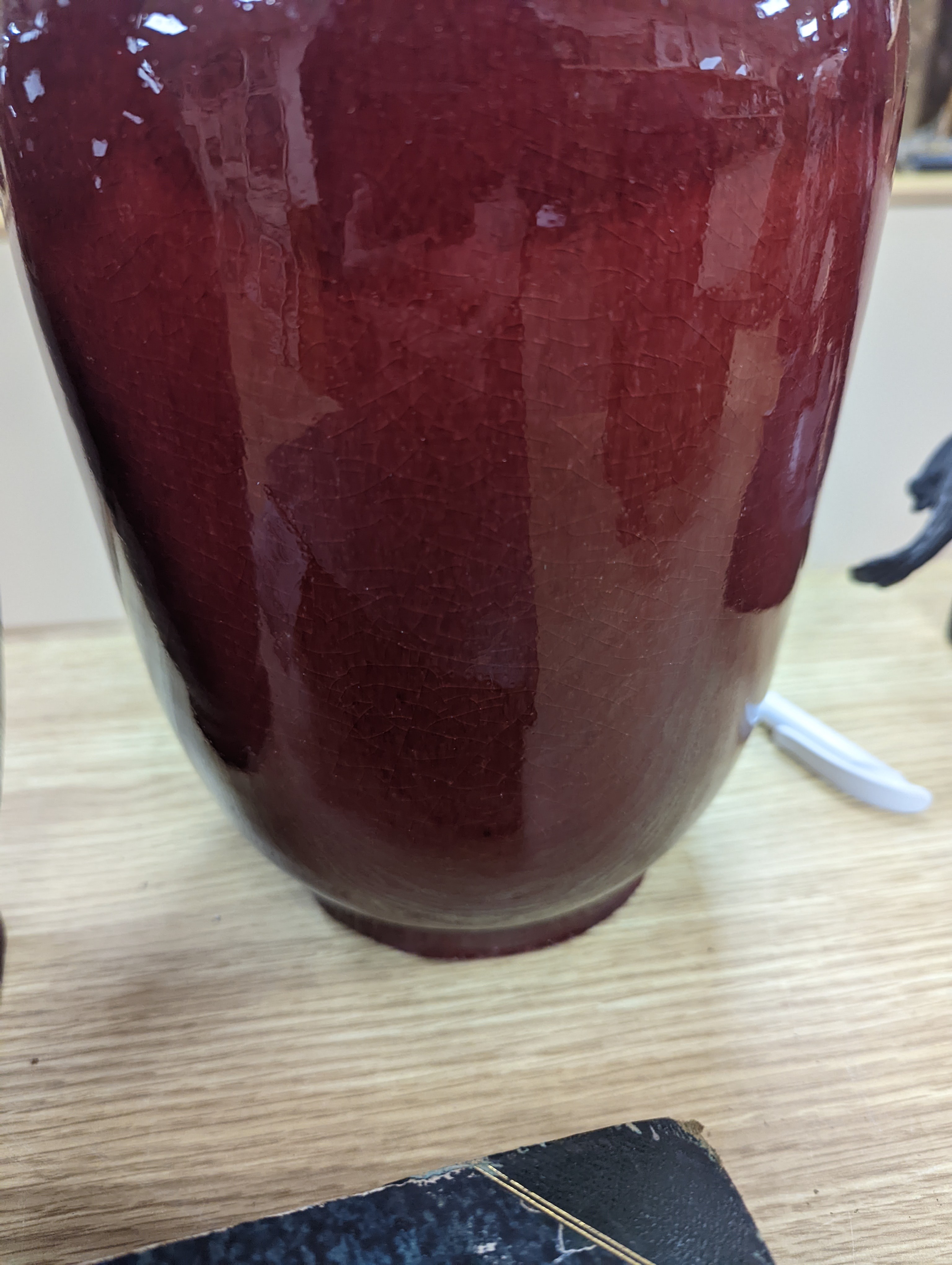 Two large Chinese sang de boeuf glazed vases tallest 36cm
